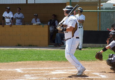 Image: Sophomore John Byers(18) turns heads with a fly ball.