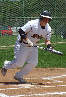 Image: John Byers(18) battles his way to a walk against Dawson.