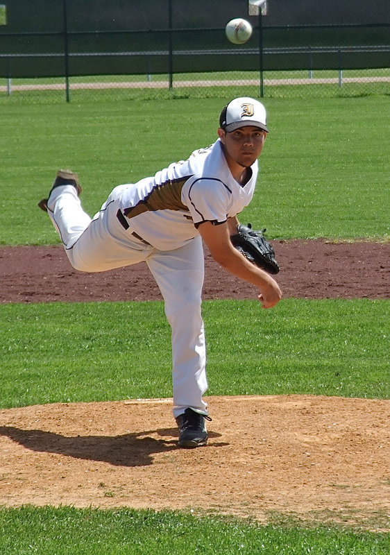Image: Pitcher Tyler Anderson(11) is determined against Dawson.
