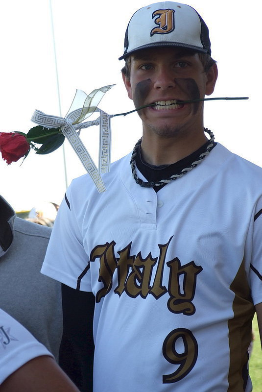Image: Cole Hopkins(9) and the Italy Gladiators come out smelling like roses after a Senior Day victory over Waxahachie Faith Family.
