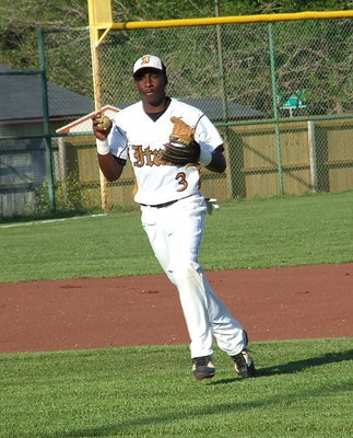 Image: Marvin Cox(3) gets warmed up for Senior Day action against Waxahachie Faith Family.