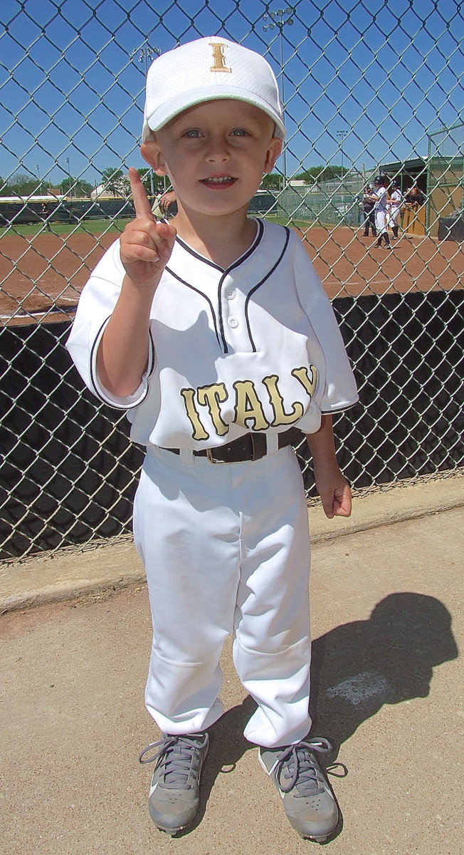 Image: IYAA Gladiator Kace Campbell supports the Lady Gladiators and his aunts, Madison and Hannah Washington.