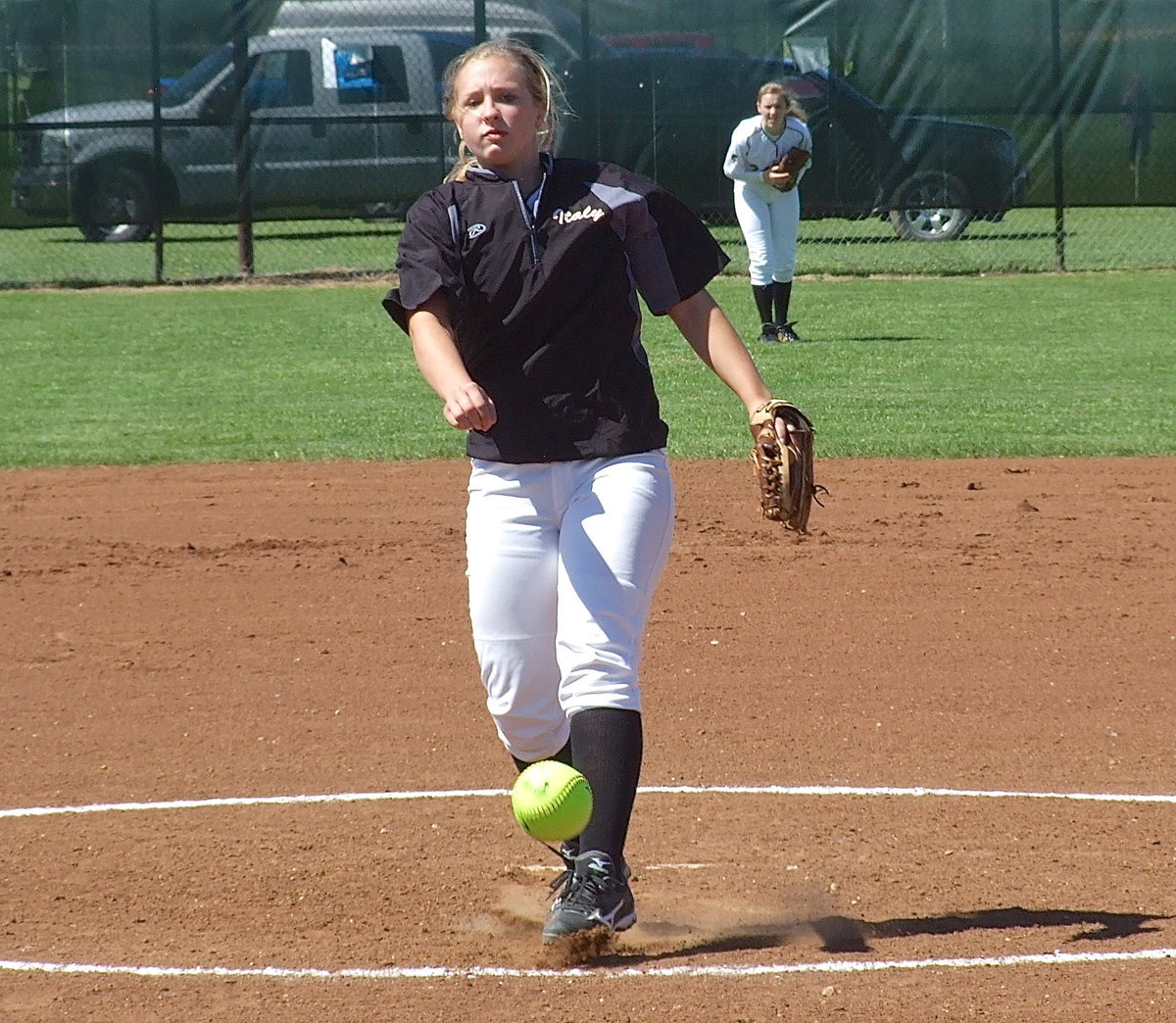 Image: Jaclynn Lewis(15) strikes out the last Ferris batter swinging to end the game with Italy winning 9-0.