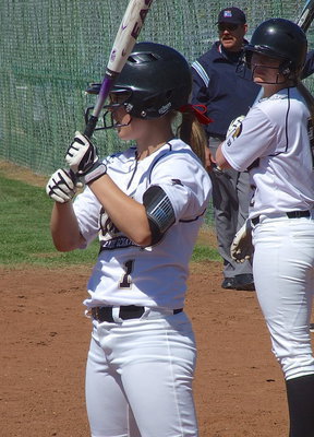 Image: Bailey Eubank(1) and Madison Washington(2) prepare to bat against Ferris.