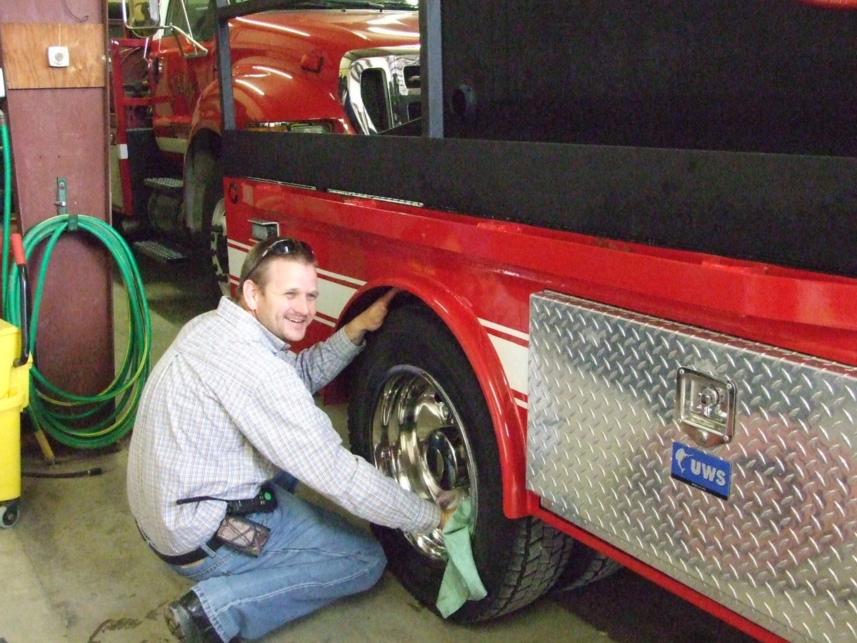 Image: Daniel Ballard gets the truck ready for the Memorial Service.