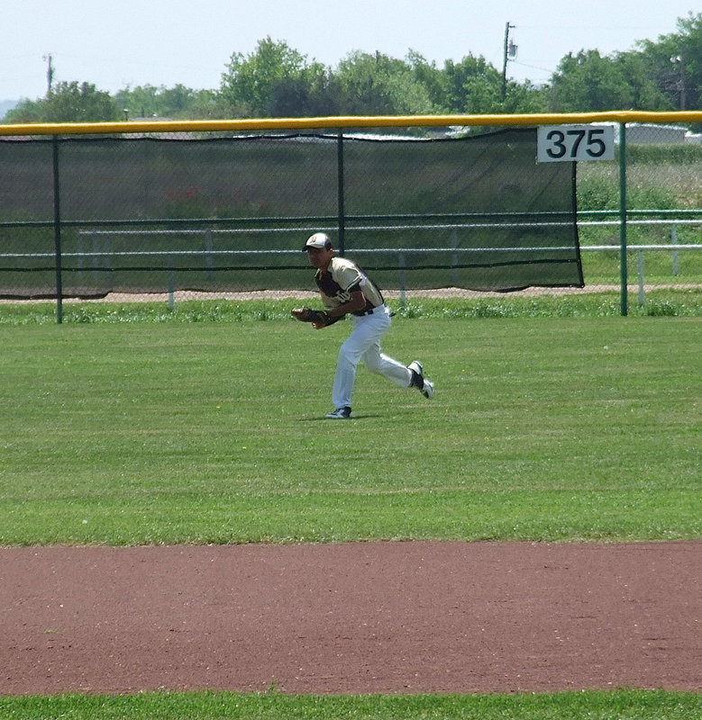 Image: Italy’s Jorge Galvan makes the catch in right field against visiting Clifton.