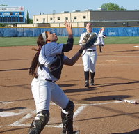 Image: Lady Gladiator catcher Alyssa Richards(9) unleashed her complete bag of tricks against Gorman. Pictured is Richards catching a popup at home plate for an Italy out and the senior also threw out a runner trying to steal second base and another that ventured too far away from third over the course of a double-header against the Lady Panthers. Italy won both games, 11-1 and 16-4, to claim the Area Championship.