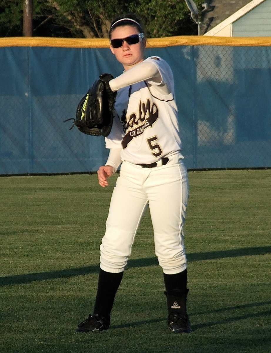 Image: Lady Gladiator outfielder Tara Wallis(5) gets ready for the finale against Gorman.