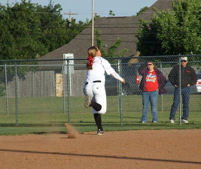 Image: Second baseman Bailey Eubank(1) chases after a popup behind first base.