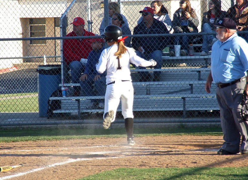 Image: Bailey Eubank(1) steps on home plate for one more Italy run.