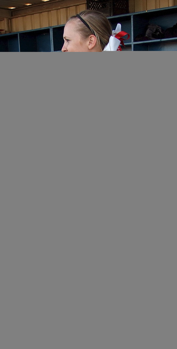 Image: Sophomore Jaclynn Lewis(15) takes a break before going back to the mound for Italy.