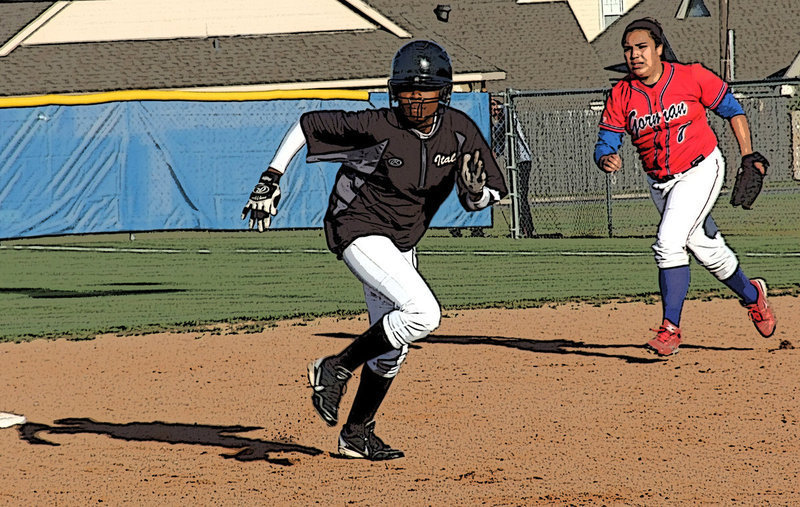 Image: Italy sophomore K’Breona Davis(11) sprints to third base. Davis scored 2 runs in total against Gorman.