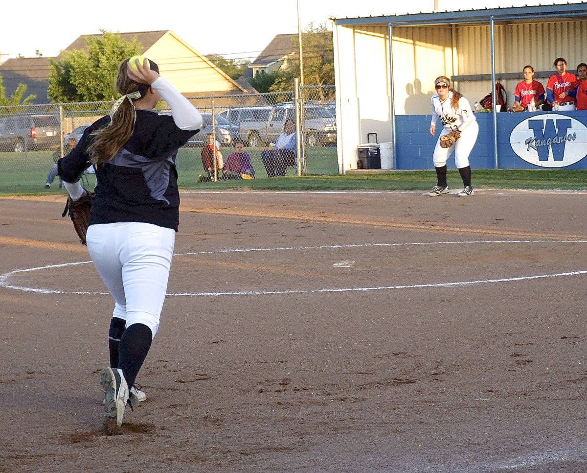Image: Third baseman Paige Westbrook(10) covers a grounder and then throws to Katie Byers(13) at first base for an Italy out against Gorman during the area championship round played Weatherford on Friday.