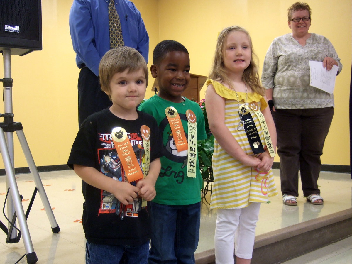 Image: Mrs. Spraberry had three proud students.