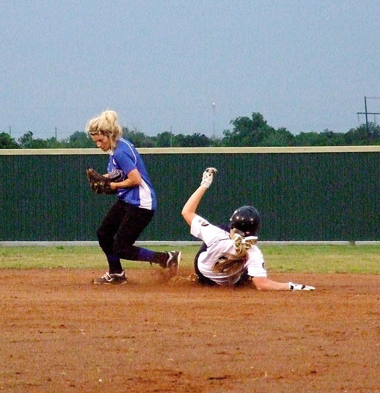 Image: Bosqueville beats Madison Washington(2) to the bag for a force out at second.