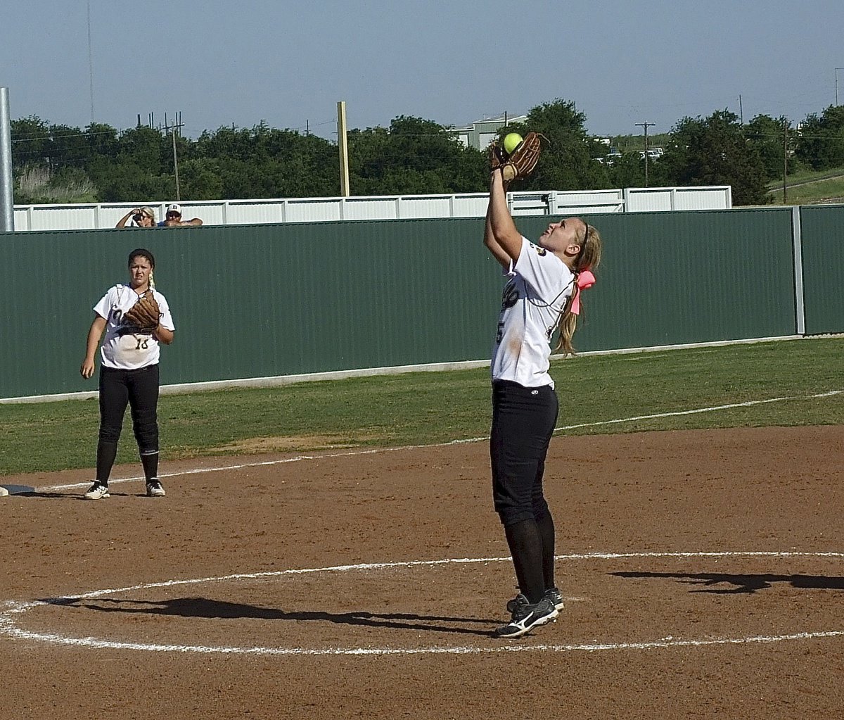 Image: Italy third baseman Paige Westbrook(10) looks on as pitcher Jaclynn Lewis(15) catches a popup for an out.