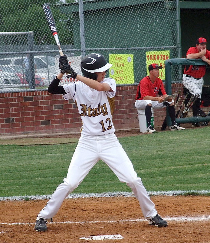Image: Designated hitter Ty Windham(12), a freshman, commands the plate for Italy.