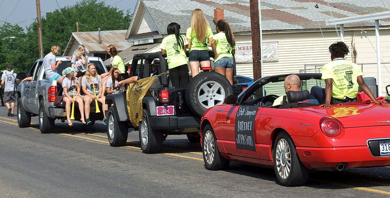 Image: Italy’s Lady Gladiator softball players and track members near the end of the parade and the end of great year for Italy High School’s student-athletes as a whole.