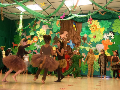 Image: Three little monkeys and a ferocious alligator.