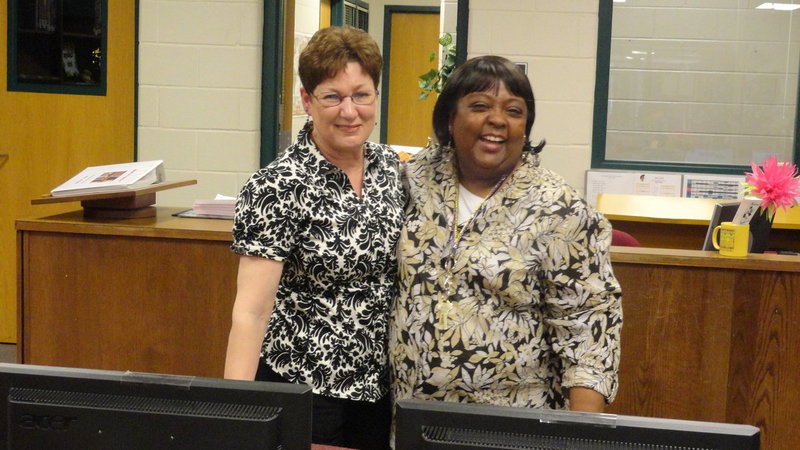 Image: Vivian Moreland says goodbye to her friend Sharan Farmer at a reception Wednesday. Moreland has been with the Italy ISD for 40 years. Farmer is retiring after 26 years, all served with the Italy ISD.