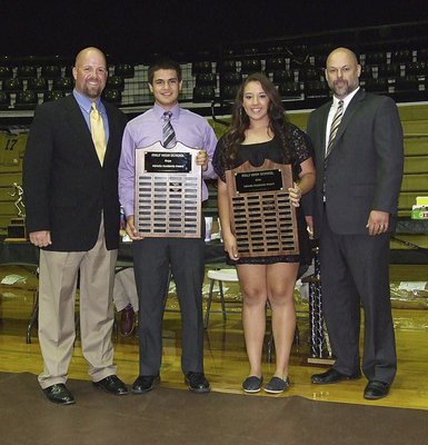 Image: Coach Hank Hollywood and principal Lee Joffre present senior Reid Jacinto with the boys Athletic Academic Award and senior Alyssa Richards with the girls Athletic Academic Award.