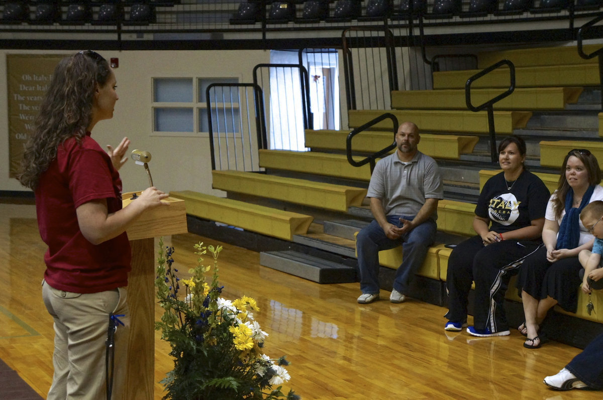 Image: Mrs. Thompson addresses the audience as the Science Fair awards begin.