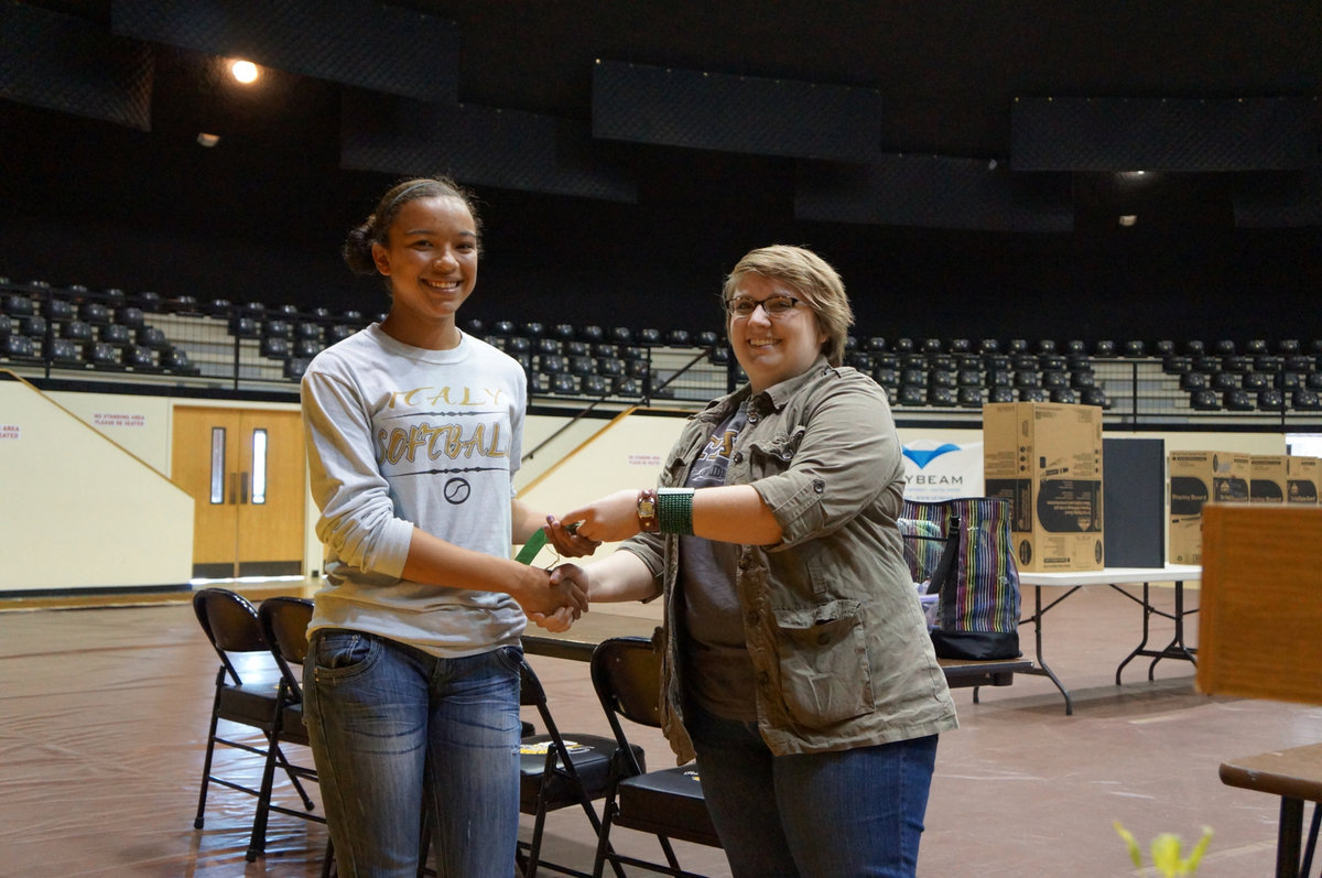 Image: April Lusk is happy to receive her ribbon.