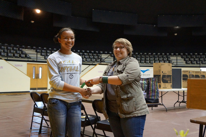 Image: April Lusk is happy to receive her ribbon.
