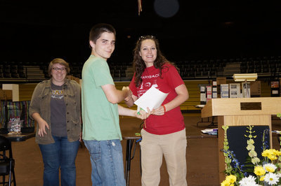 Image: Aaron Latimer receives his award.