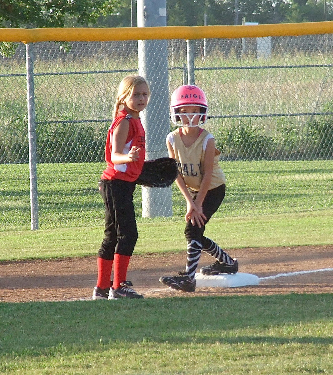 Image: Paige Butler reaches third base for Italy.
