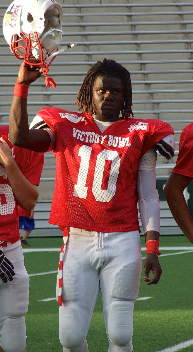 Image: Representing Italy High School, the Italy Gladiator Football program and the FCA Victory Bowl V Red Team All-Stars is Ryheem Walker(10) who is introduced during a halftime presentation.