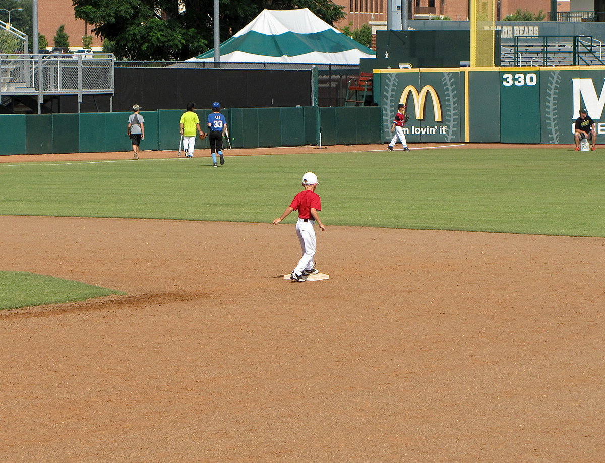 Image: Dustin Duke steals second during a drill.