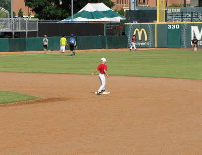 Image: Dustin Duke steals second during a drill.