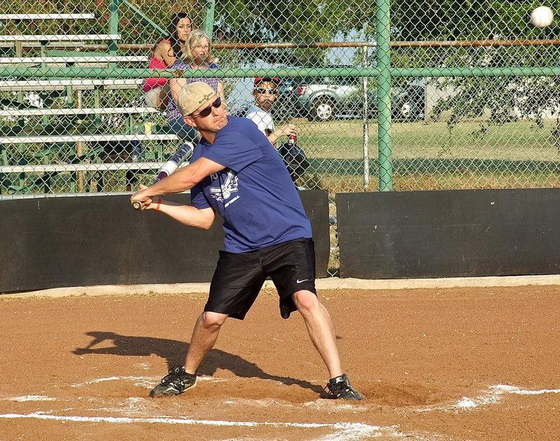 Image: Criminal Investigator Perry Kaemmerling tries to figure out the clue to hitting one over the fence.
