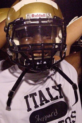 Image: Tamarcus Sheppard breaks the final huddle of Midnight Madness with his teammates.