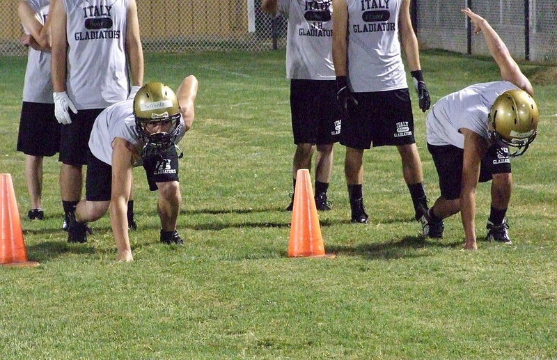 Image: Gladiators Coby Bland and Joe Celis get set to be timed in the 40 yard dash.