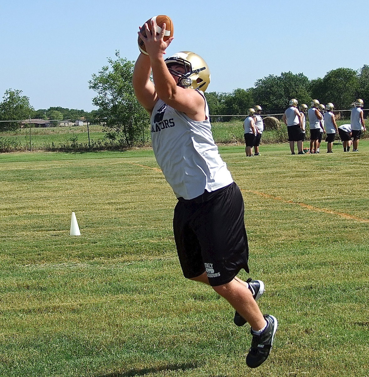 Image: Senior defensive end Zain Byers will anchor what could be a stubborn, big play defense for Italy as he simulates a lineman’s dream.