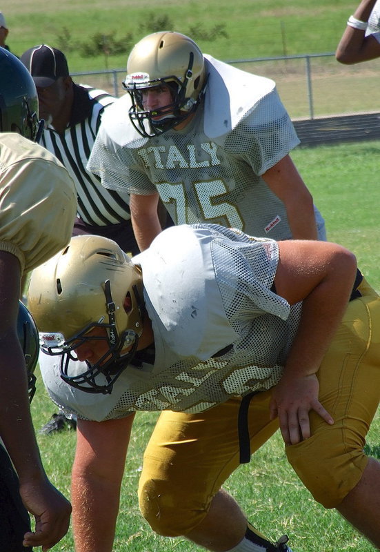 Image: Italy’s inside linebacker, Kyle Fortenberry(75), and defensive tackle Kevin Roldan(50) are ready to finish strong against Valley Mills and preserve their defense’s 6-0 shutout.