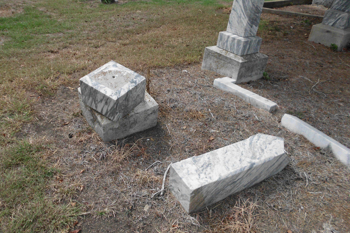 Image: It took strength for the vandals to move this from its proper resting place.