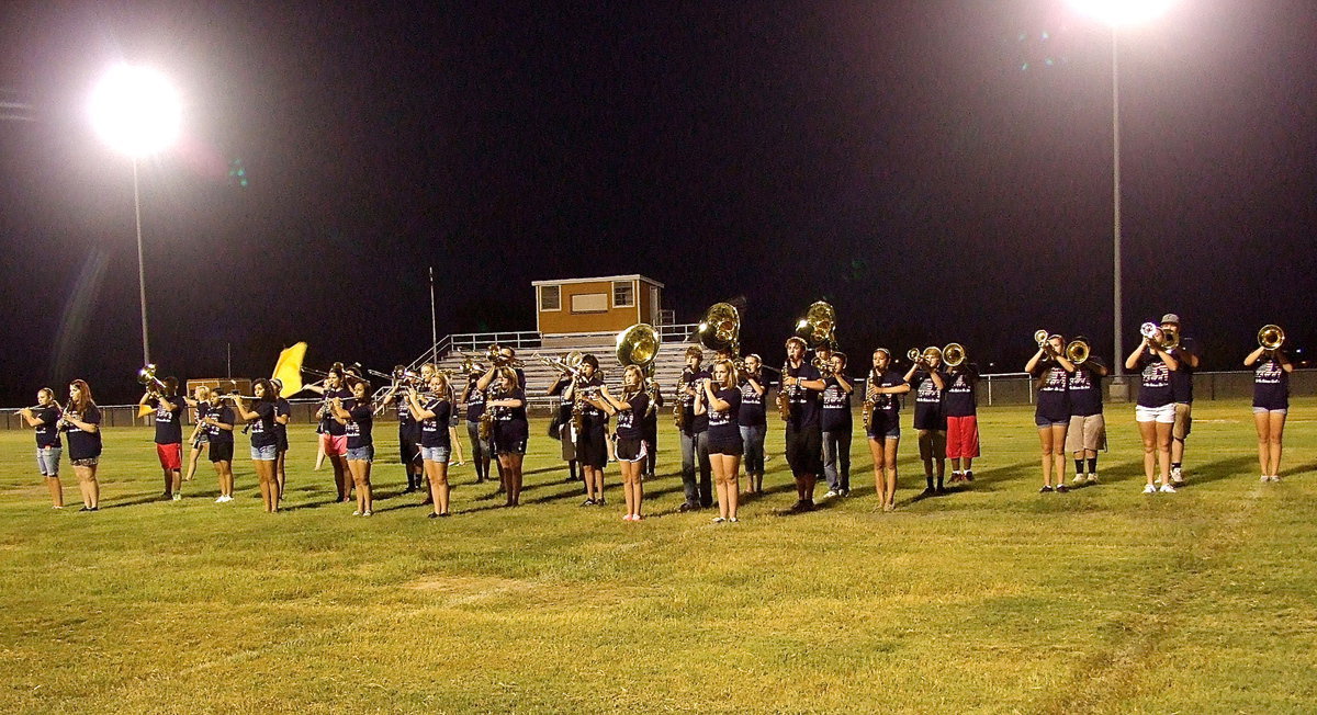 Image: The band is in attack formation.