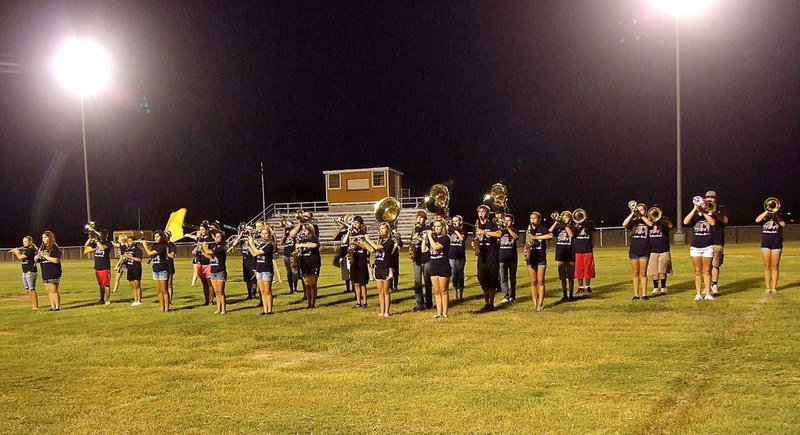 Image: The band is in attack formation.