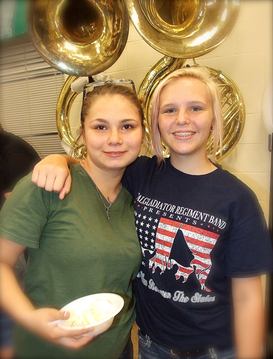 Image: Desi Brooks and Jennifer McDaniel sport amazing new tuba hats.