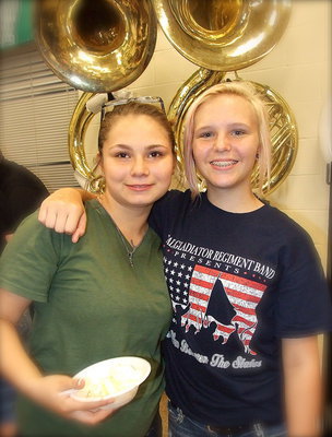 Image: Desi Brooks and Jennifer McDaniel sport amazing new tuba hats.
