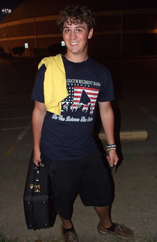 Image: The lone senior male band member JoeMack Pitts is happy to be the king.