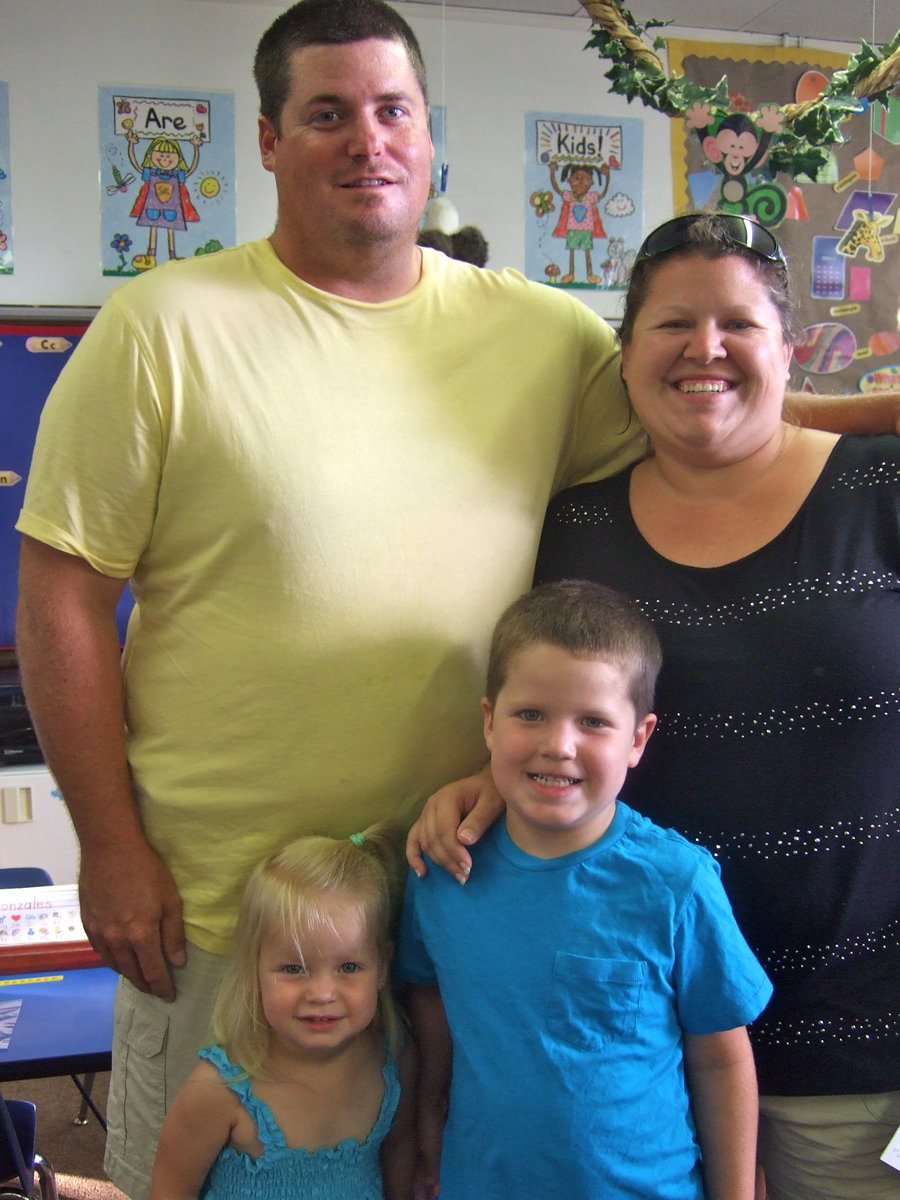Image: Allie Jo Howard, Hank Howard, Joe Howard and Alice Howard came as a family to meet the teacher.