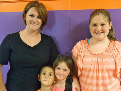 Image: Chrissy Guerrero, Raegan Jones, George Guerrero and Chole Jones are ready for school to start.