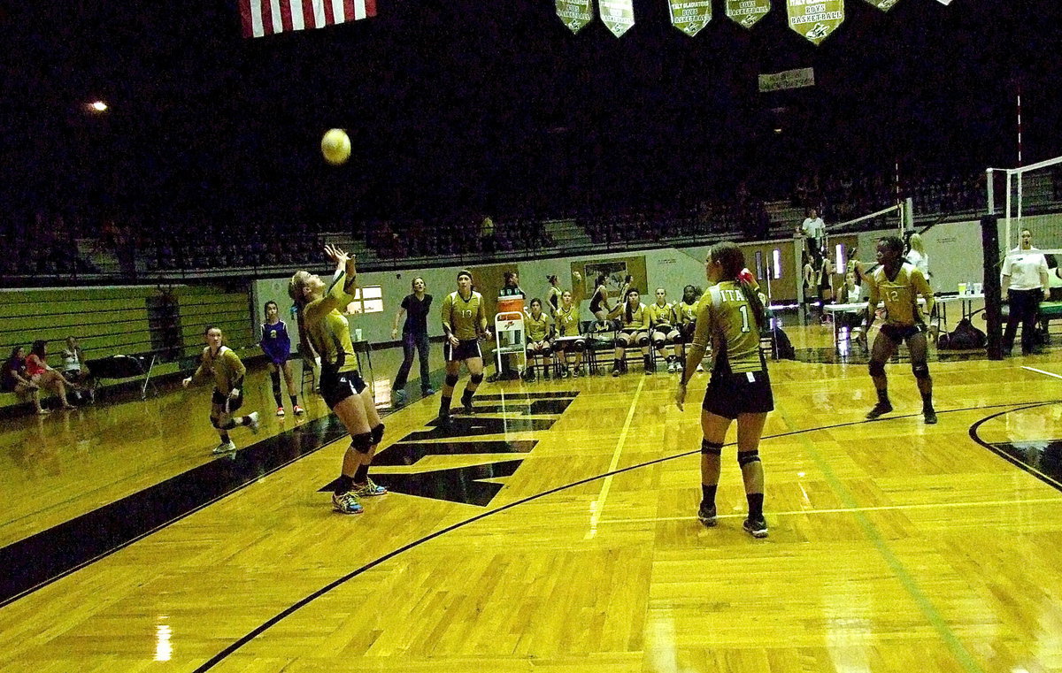Image: Italy Lady Gladiator Madison Washington(10) bumps the ball from the backcourt during first set action against the Venus Lady Bulldogs during a round-robin hosted inside Italy Coliseum.