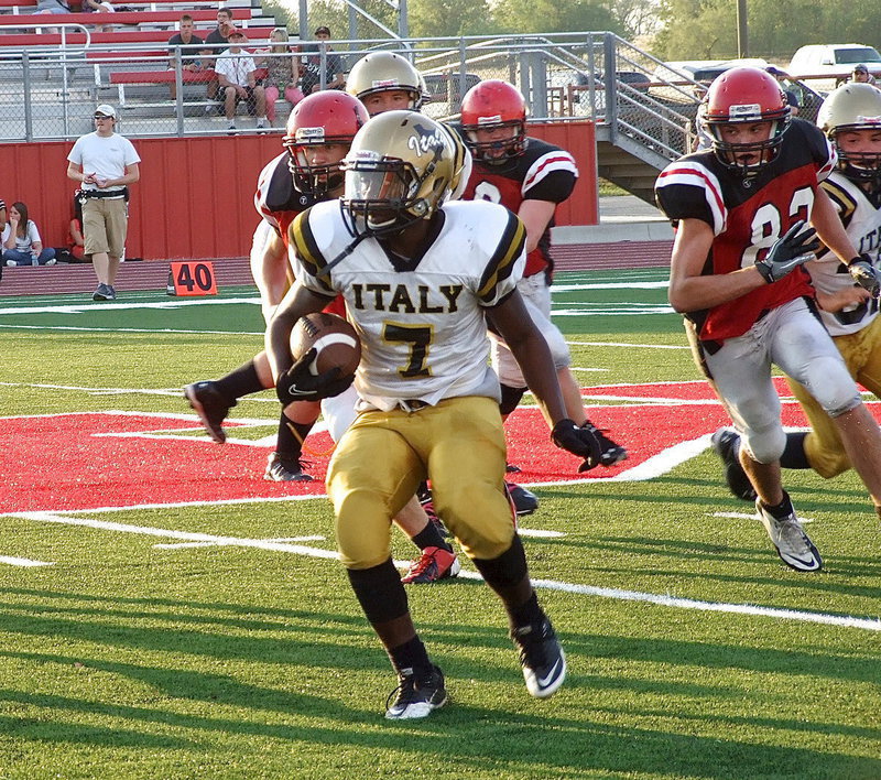 Image: Johnny Norris(7) finds daylight against the Panther defense.