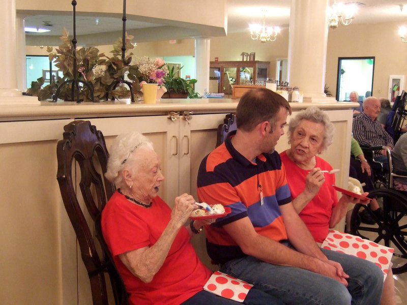 Image: Doug Merrell (physical therapist) visits with the ladies.