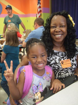Image: Ida Overton and granddaughter Jordan Flemming (Pre-K) sharing lunch.